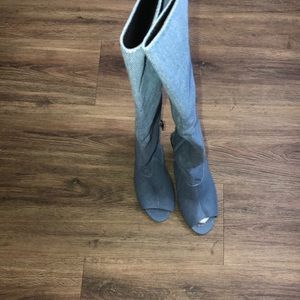 denim over the knee boots with toe out